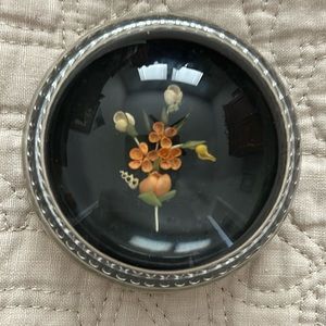 Glass paper weight with shell floral design
